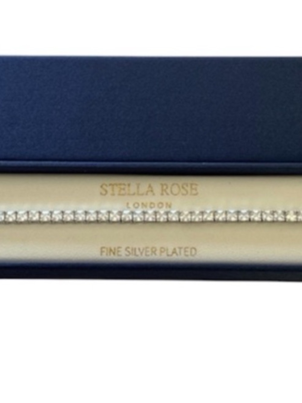 NEW Stella Rose silver plated tennis bracelet. Box included. Perfect gift!
7.5”